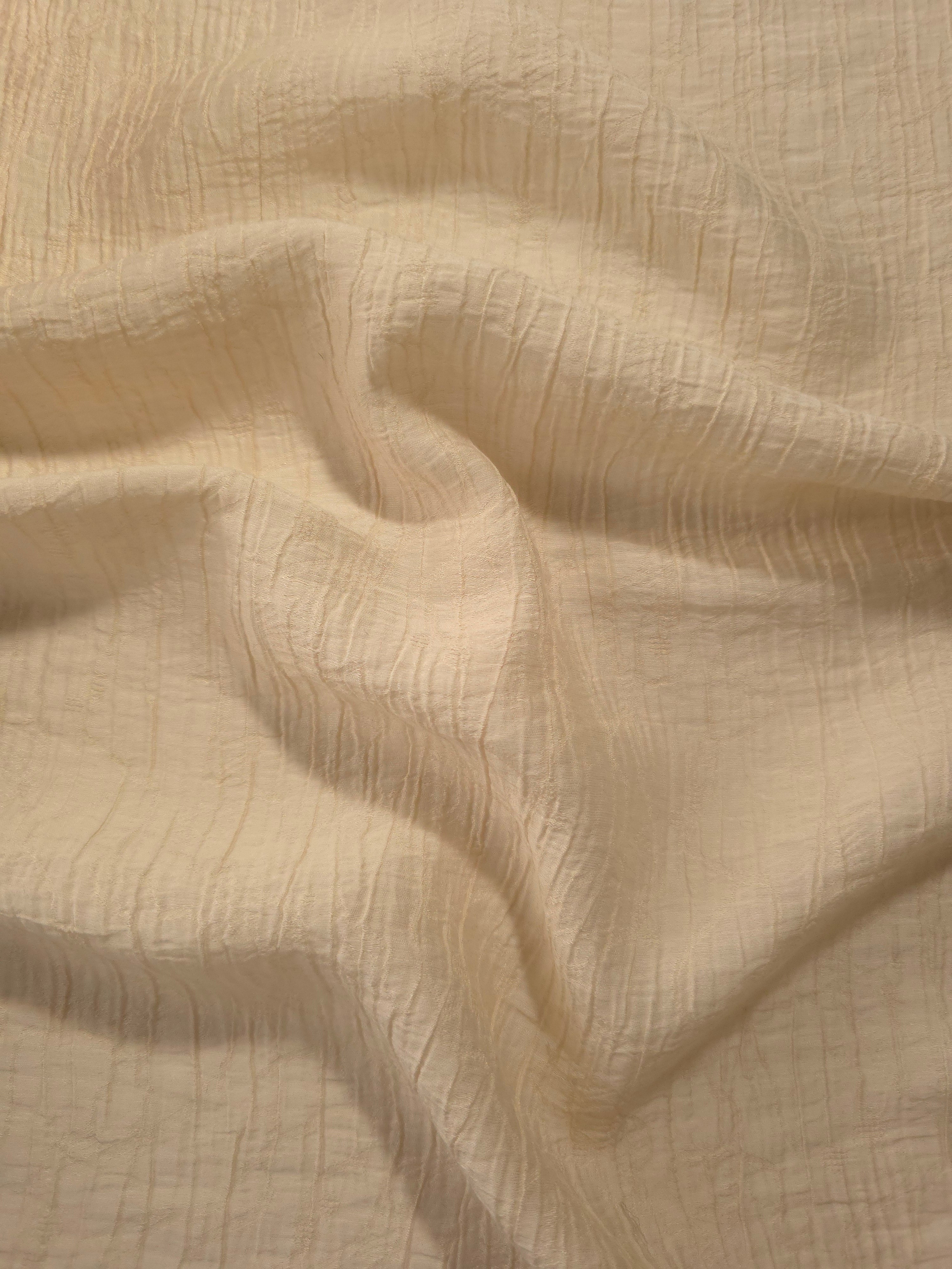 Draped Butter Yellow Tencel jacquard showing airy movement for kaftans and dresses.