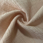 Close-up of Soft Beige Tencel jacquard showing subtle woven texture and light weave.