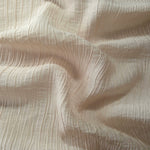 Draped Soft Beige Tencel jacquard showing airy movement for kaftans and dresses.
