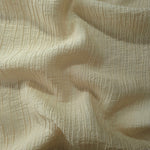 Close-up of Butter Yellow Tencel jacquard showing subtle woven texture and light weave.