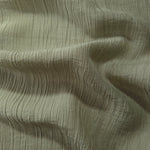 Close-up of Sage Green Tencel jacquard showing subtle woven texture and light weave.