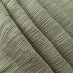 Flowing Sage Green Tencel jacquard with subtle woven texture for lined dress layers.