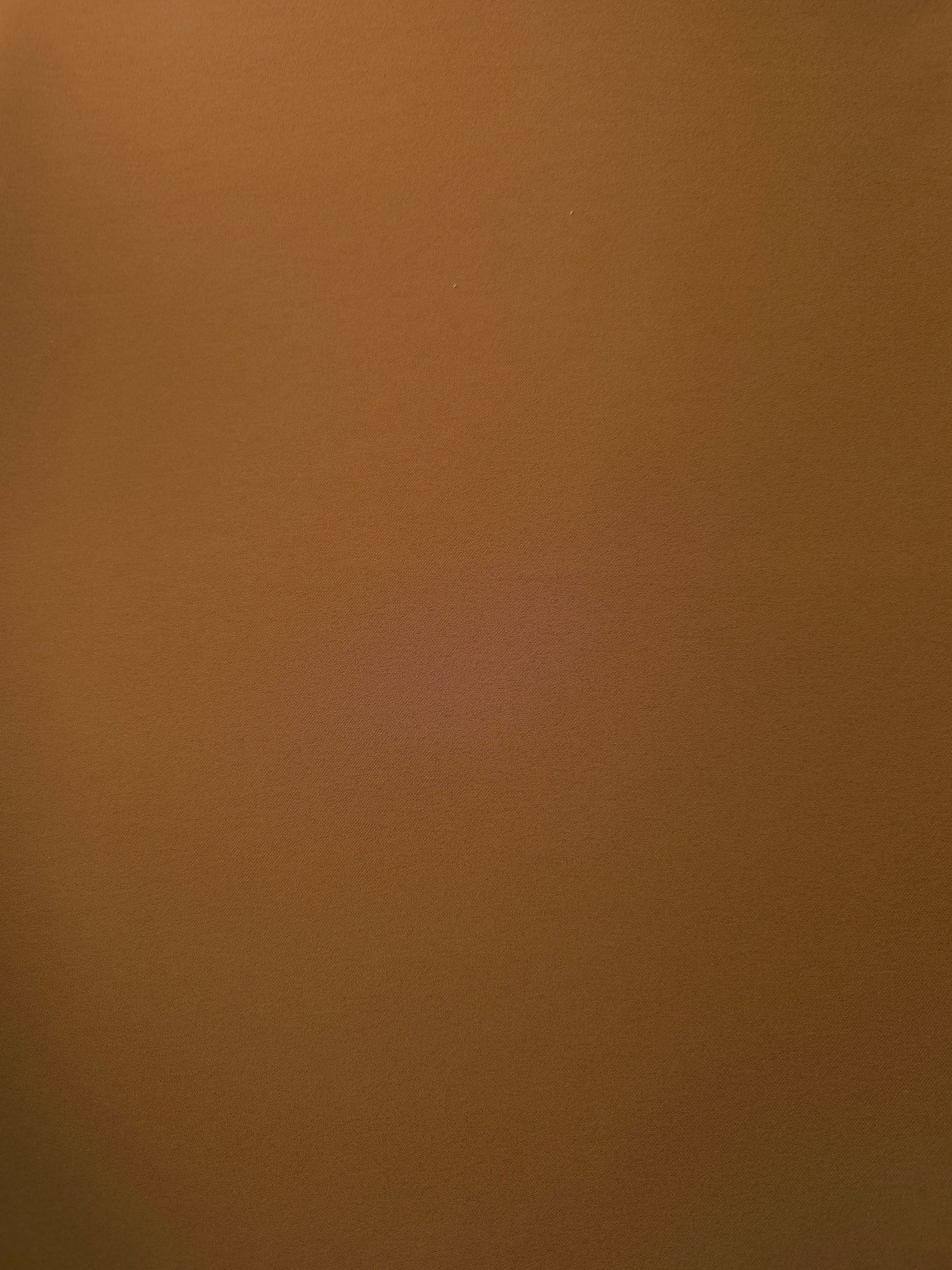 Toffee Brown 205 GSM Korean polyester crepe shown flat, an opaque smooth woven dress fabric with a silky-soft finish
