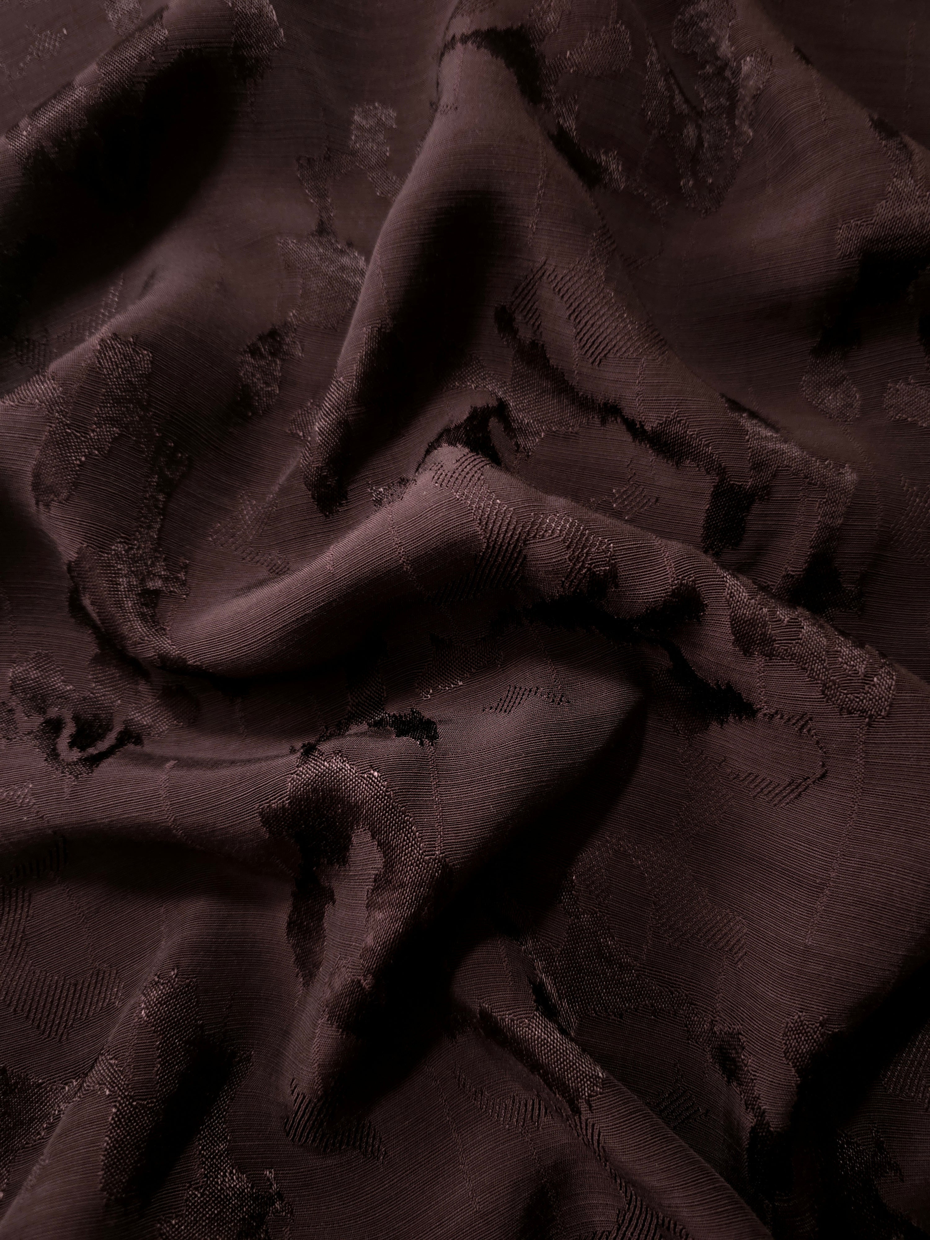 Wine burgundy abstract botanical viscose rayon jacquard in a soft flowing drape for kaftans, maxi dresses and elegant abayas.