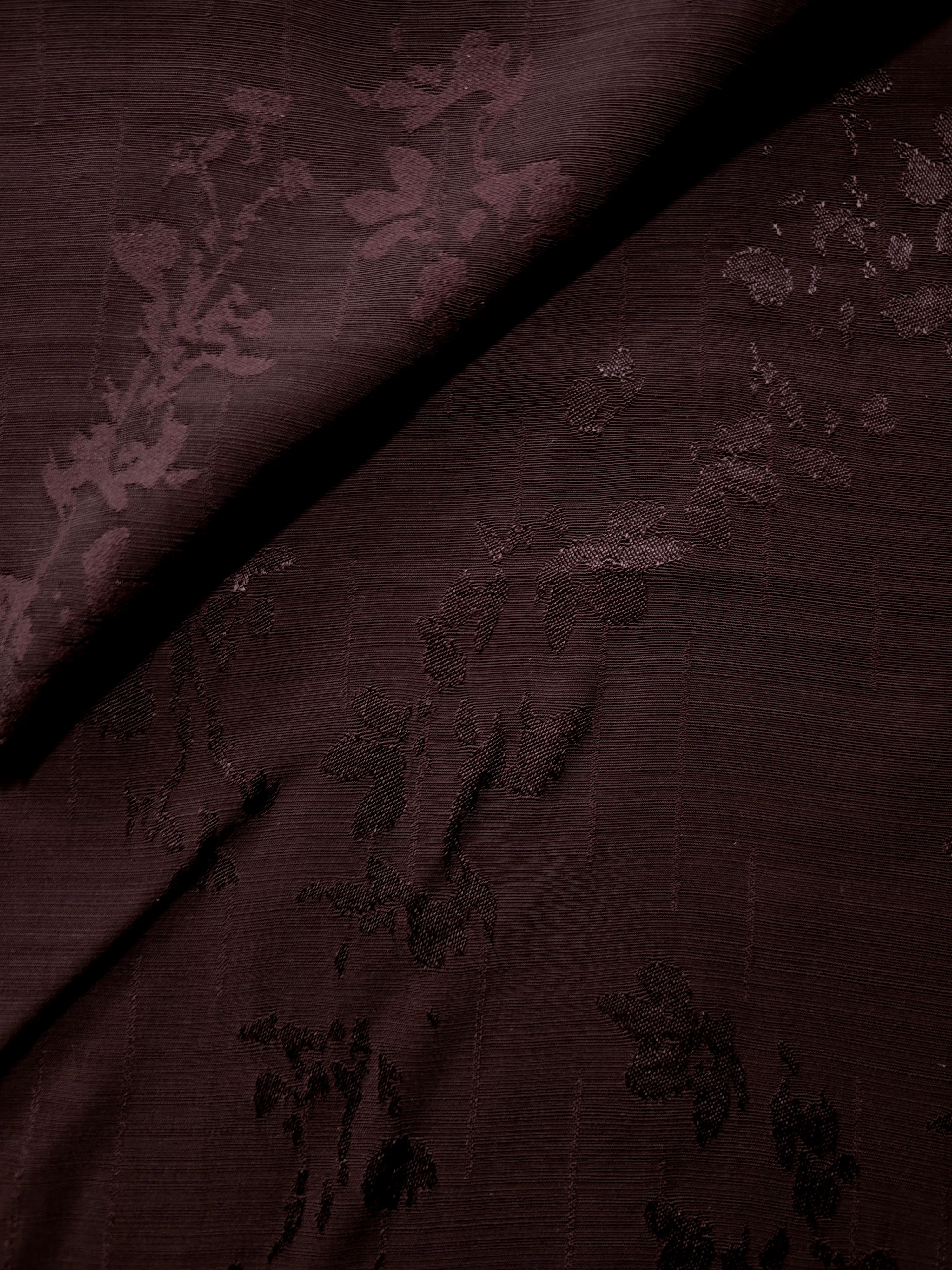 Deep burgundy rose-pattern jacquard viewed from both sides, helping assess it for lined dresses, modest tunics and flowing robes.