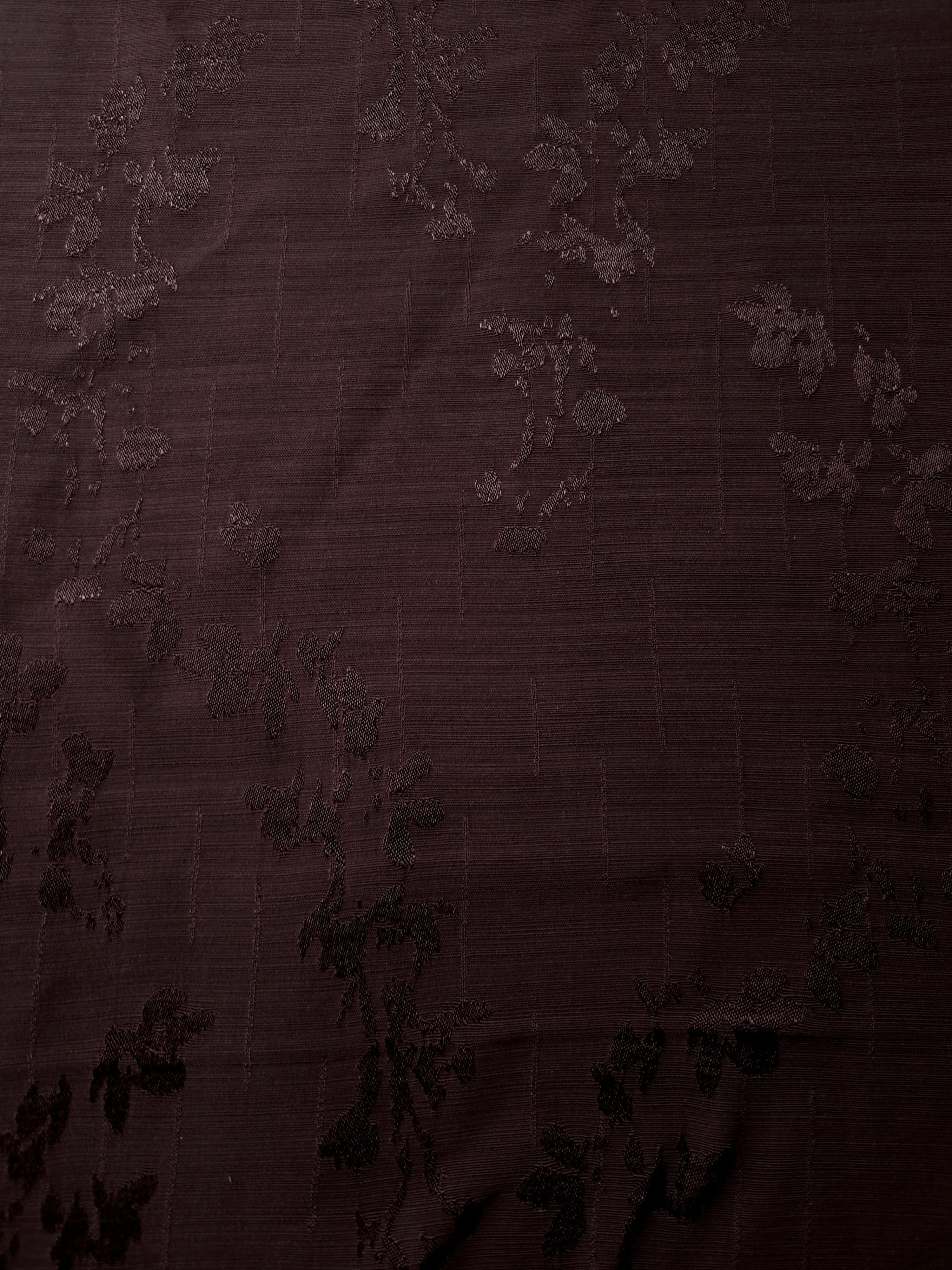 Complete rose vine repeat on deep burgundy tone-on-tone rayon jacquard for statement maxi skirts, dresses and matching separates.