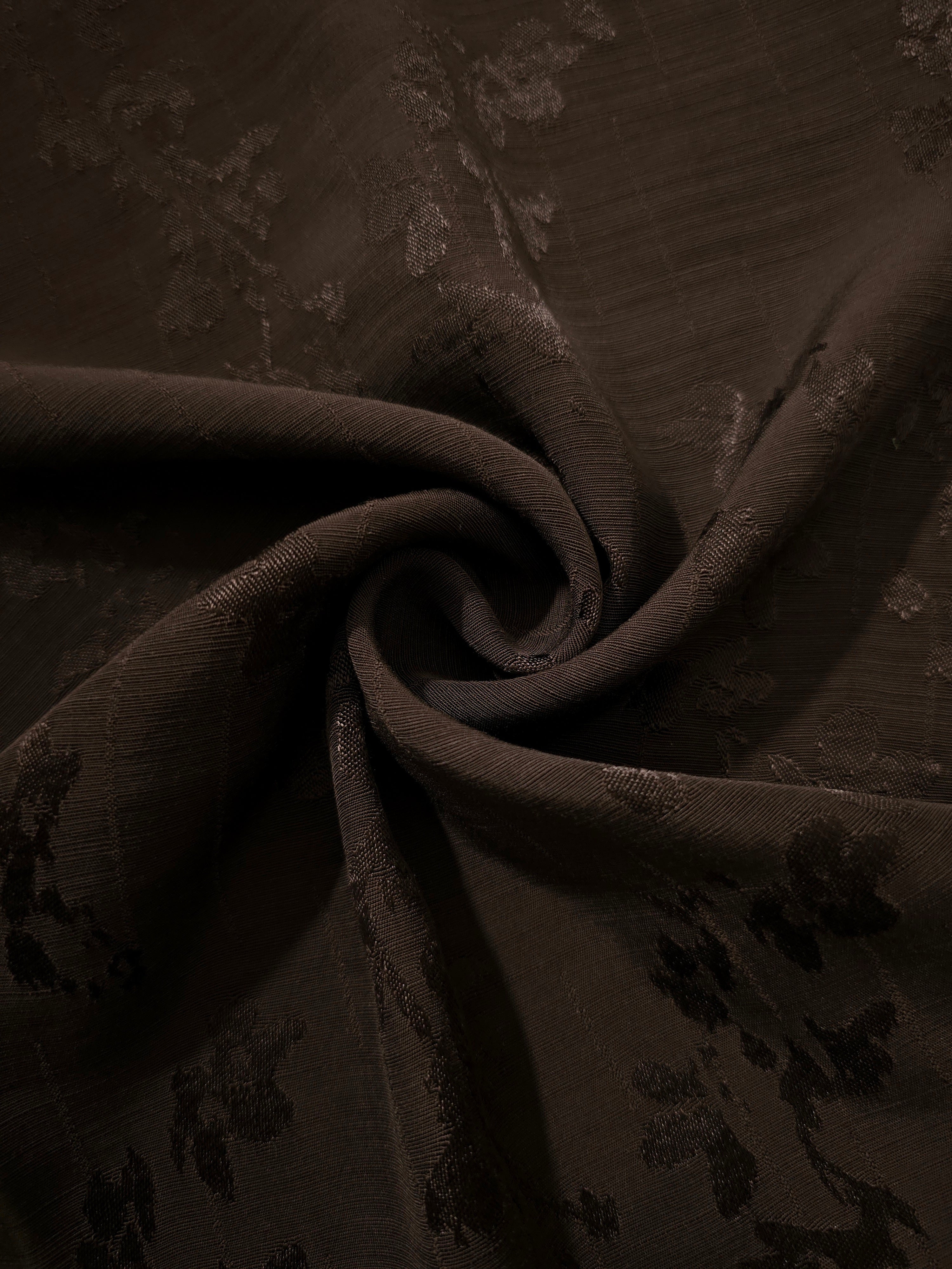 Gathered espresso brown rayon jacquard highlighting fluid movement for ruched blouses, gathered skirts and graceful occasion dresses.