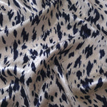 Navy blue animal print Turkish rayon viscose jacquard fabric in a wave drape