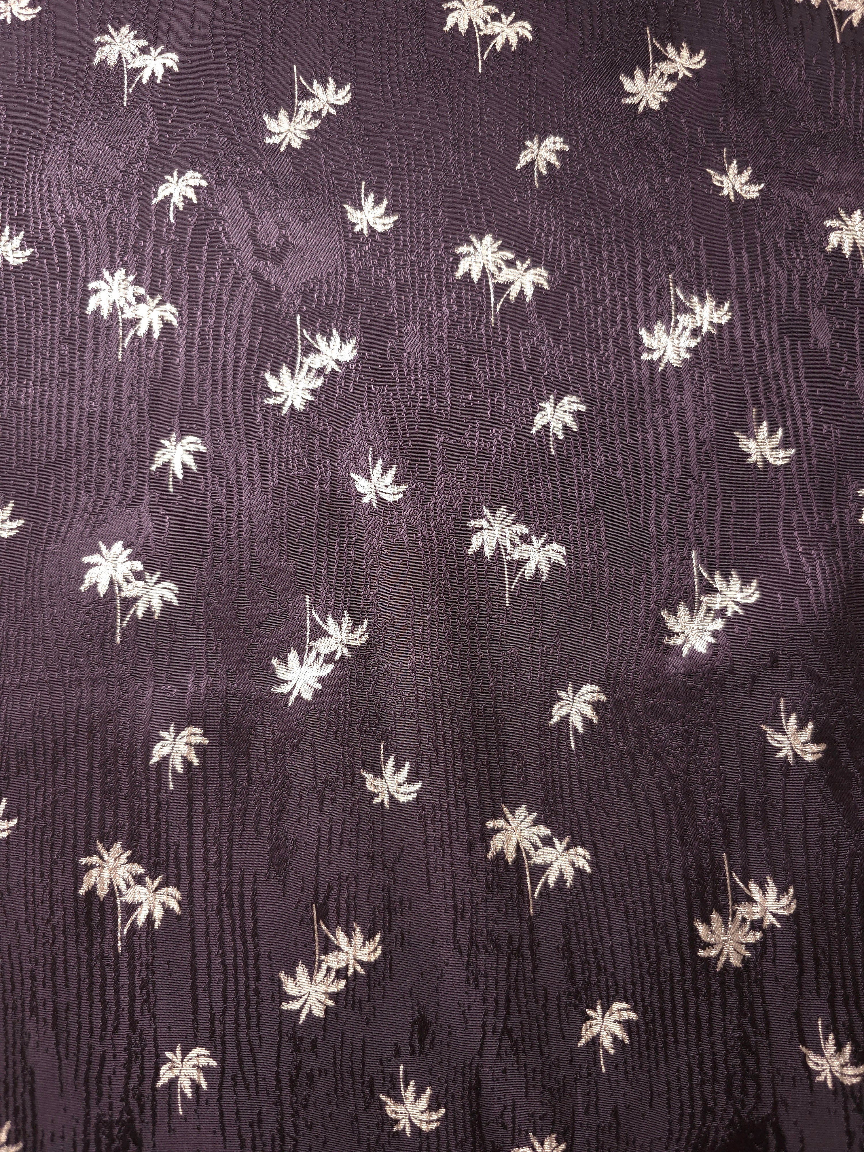 Wide view of the plum purple palm tree repeat, designed for maxi dresses, tunics and relaxed blouses.