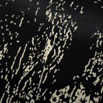 Close-up of Formal Black - Charcoal silky rayon fabric with tonal distressed ink line print for abayas.