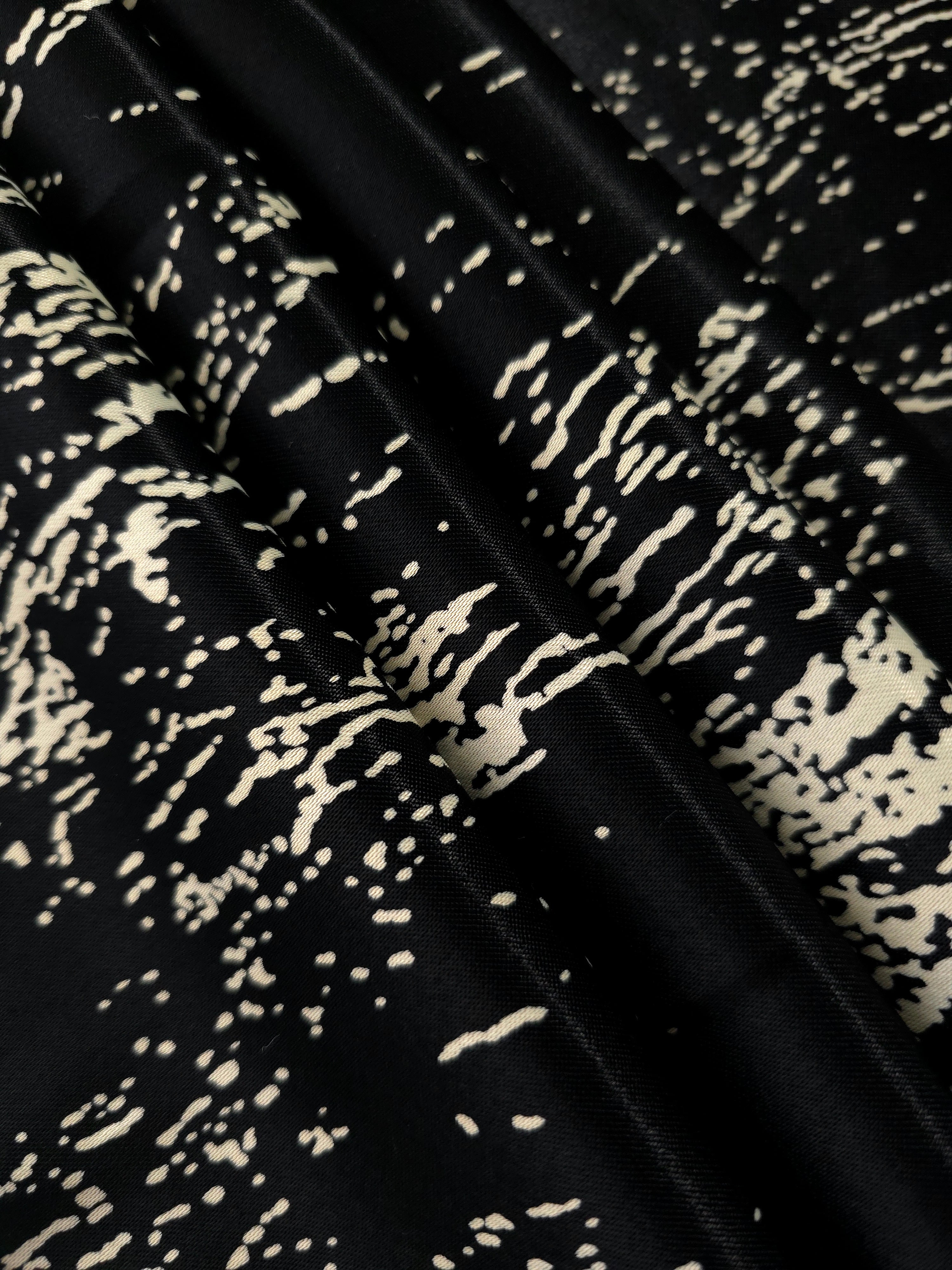 Folded Formal Black - Charcoal distressed ink line rayon, 176 GSM fabric for boutique modestwear sourcing.