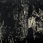 Wide shot of Formal Black - Charcoal Turkish silky rayon fabric for black abaya and kaftan yardage.