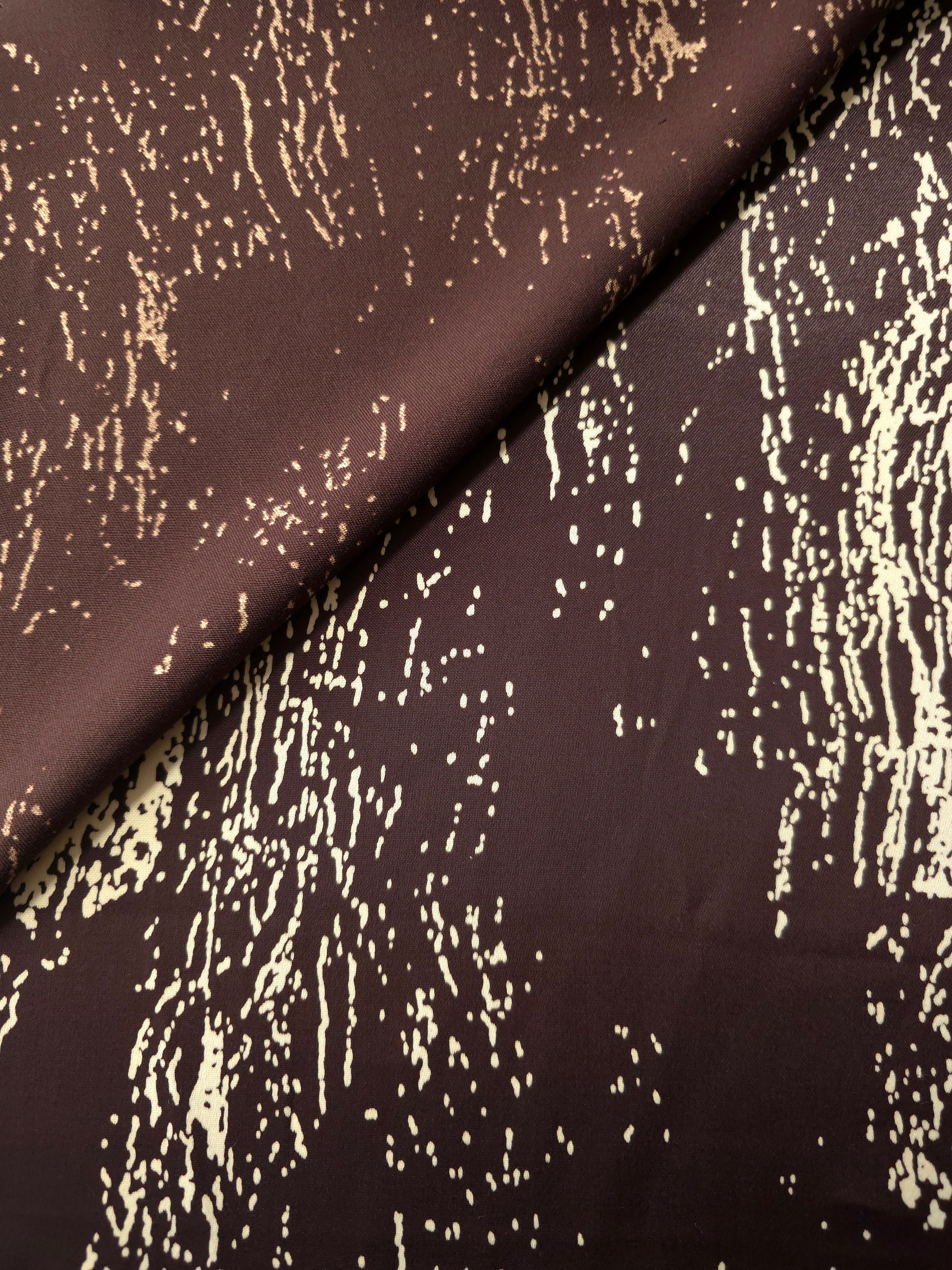 Front and back view of Chocolate Brown - Black ink line rayon fabric for print coverage and lining checks.