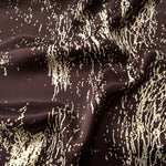 Wave shot of Chocolate Brown - Black silky rayon with distressed line print for Eid kaftans and abayas.