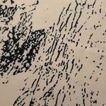 Close-up of Vanilla Cream - Black silky rayon fabric with distressed ink line print for modest dress fabric.