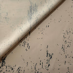 Front and back view of Vanilla Cream - Black distressed ink line fabric for lining and opacity assessment.