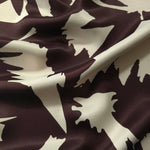 Wave shot of Chocolate Brown - Black Turkish rayon fabric showing soft movement for kaftans and abayas.