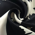 Draped Formal Black - Charcoal Turkish rayon fabric showing fluid fall for black abayas and kaftans.
