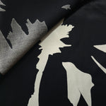 Front and back view of Formal Black - Charcoal bold petal rayon fabric for modest dress coverage checks.