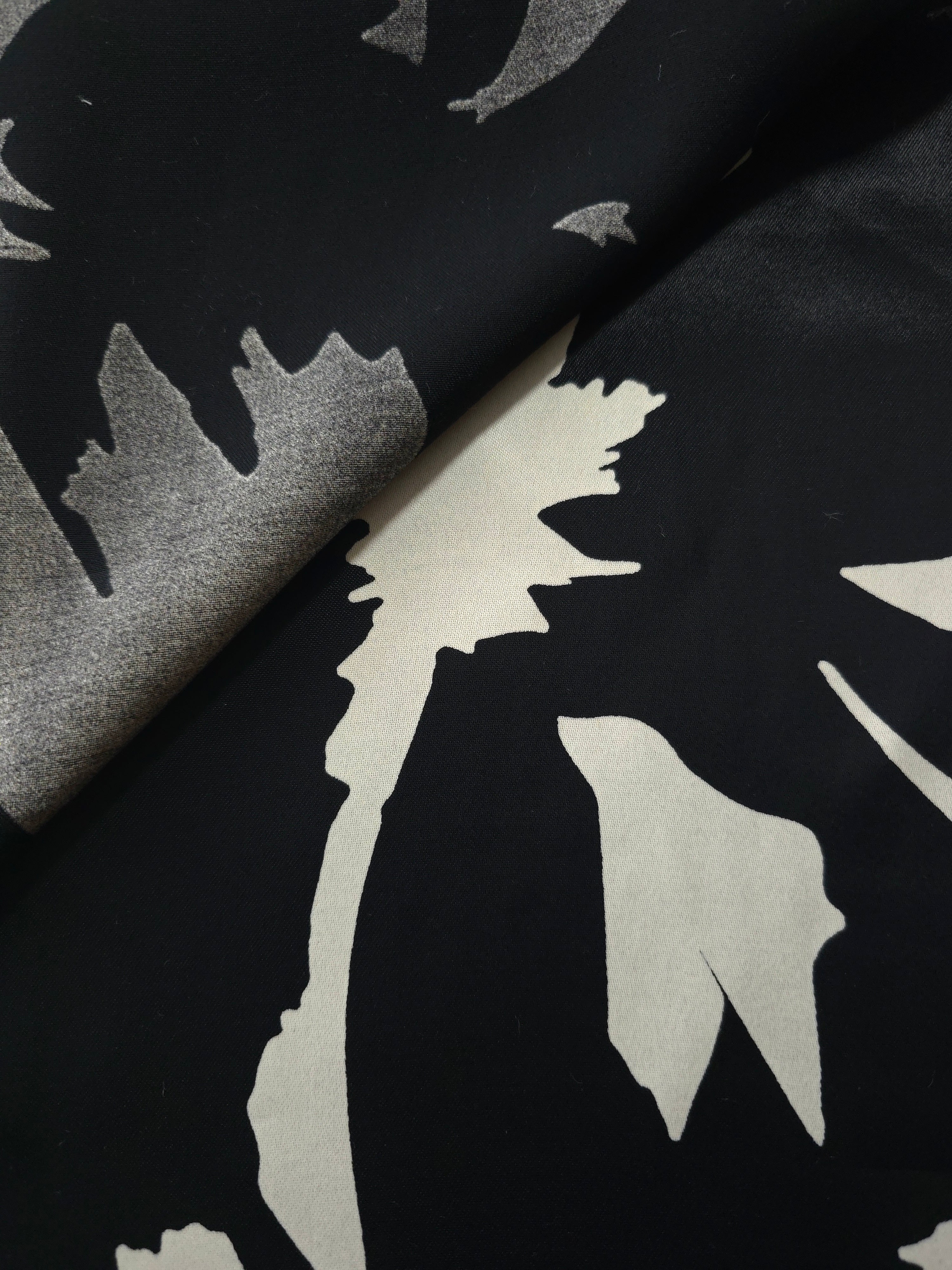 Front and back view of Formal Black - Charcoal bold petal rayon fabric for modest dress coverage checks.