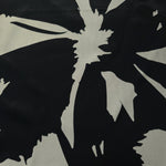 Wide shot of Formal Black - Charcoal Turkish silky rayon fabric for black abaya and kaftan yardage.