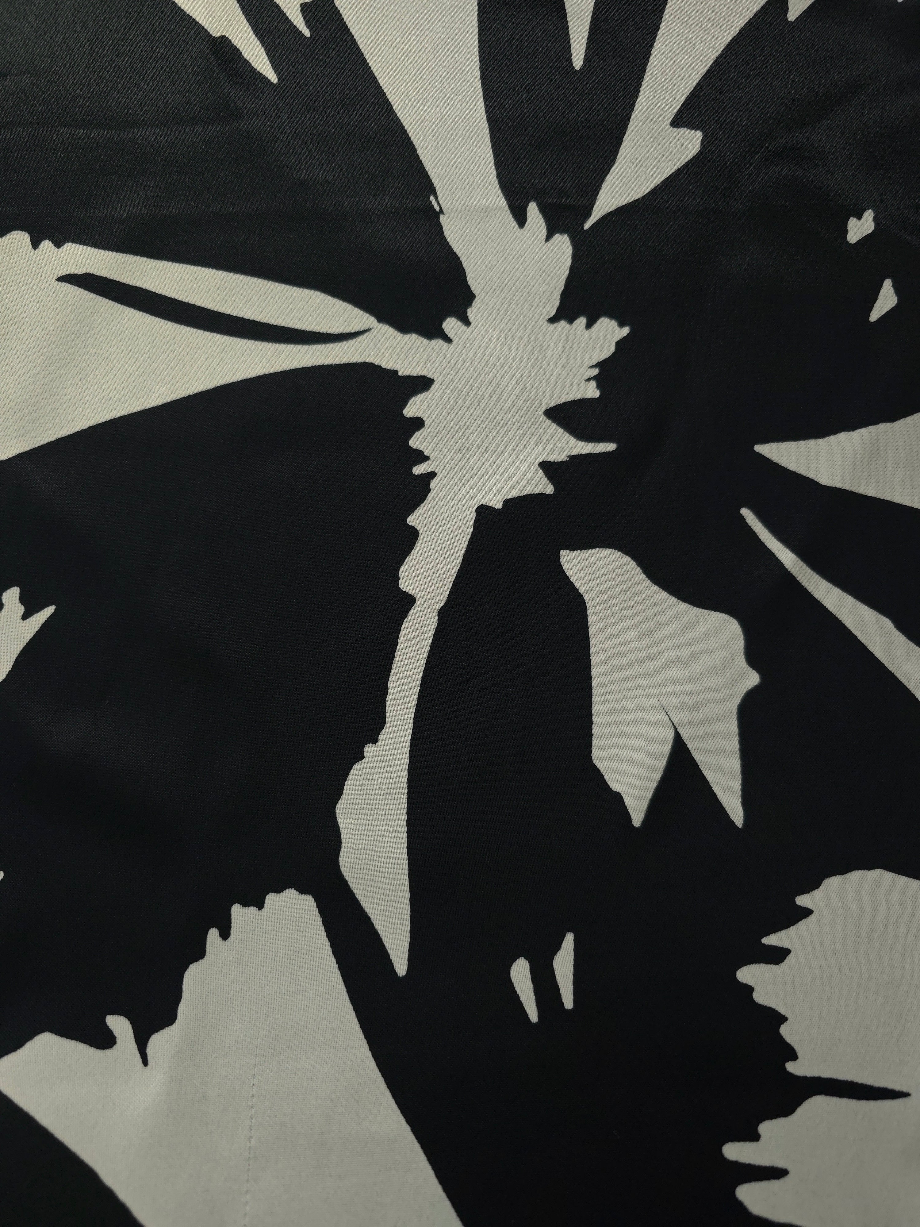 Wide shot of Formal Black - Charcoal Turkish silky rayon fabric for black abaya and kaftan yardage.
