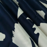 Folded Turkish rayon Empirme fabric in Midnight Blue - Black, 176 GSM printed fabric for boutique sourcing.