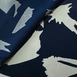 Front and back view of Midnight Blue - Black bold abstract petal rayon fabric for modest dress lining decisions.