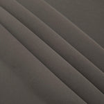 Layered Warm Charcoal Gray mechanical polyester crepe showing soft structure and slight mechanical stretch for tailoring