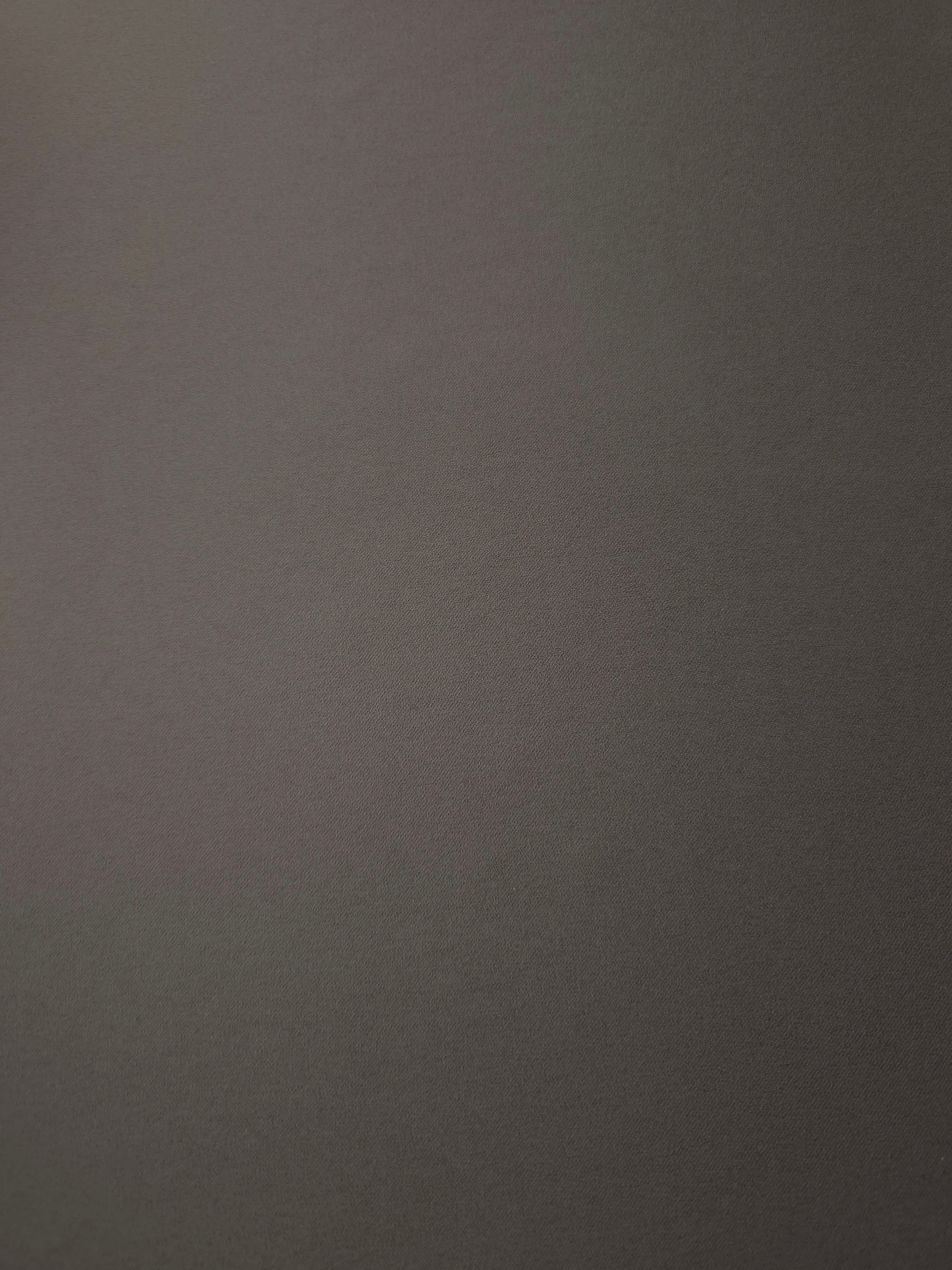 Warm Charcoal Gray 205 GSM Korean polyester crepe shown flat, an opaque woven dress fabric with a silky-soft finish