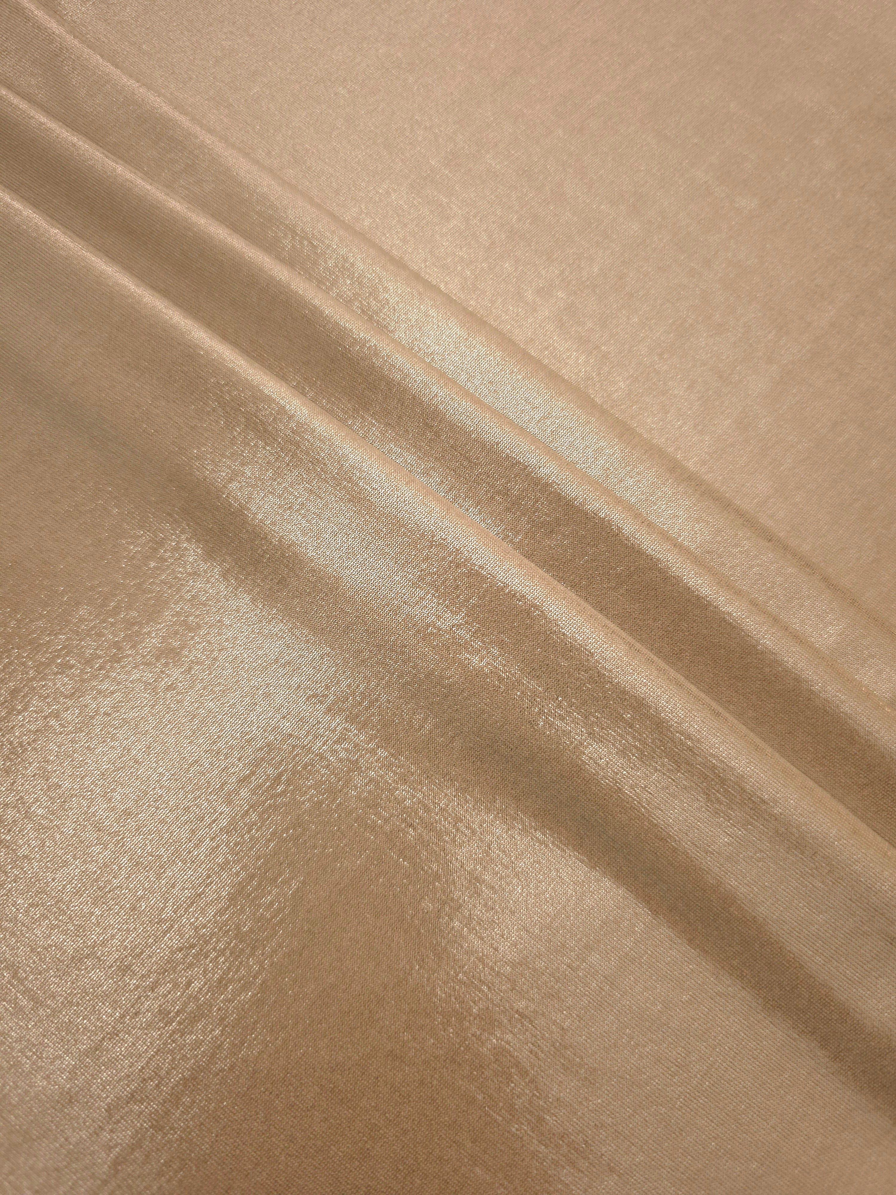 Layered Warm Taupe Beige shimmer stretch fabric showing metallic foil depth and soft structure for costumes, skirts and fashion apparel