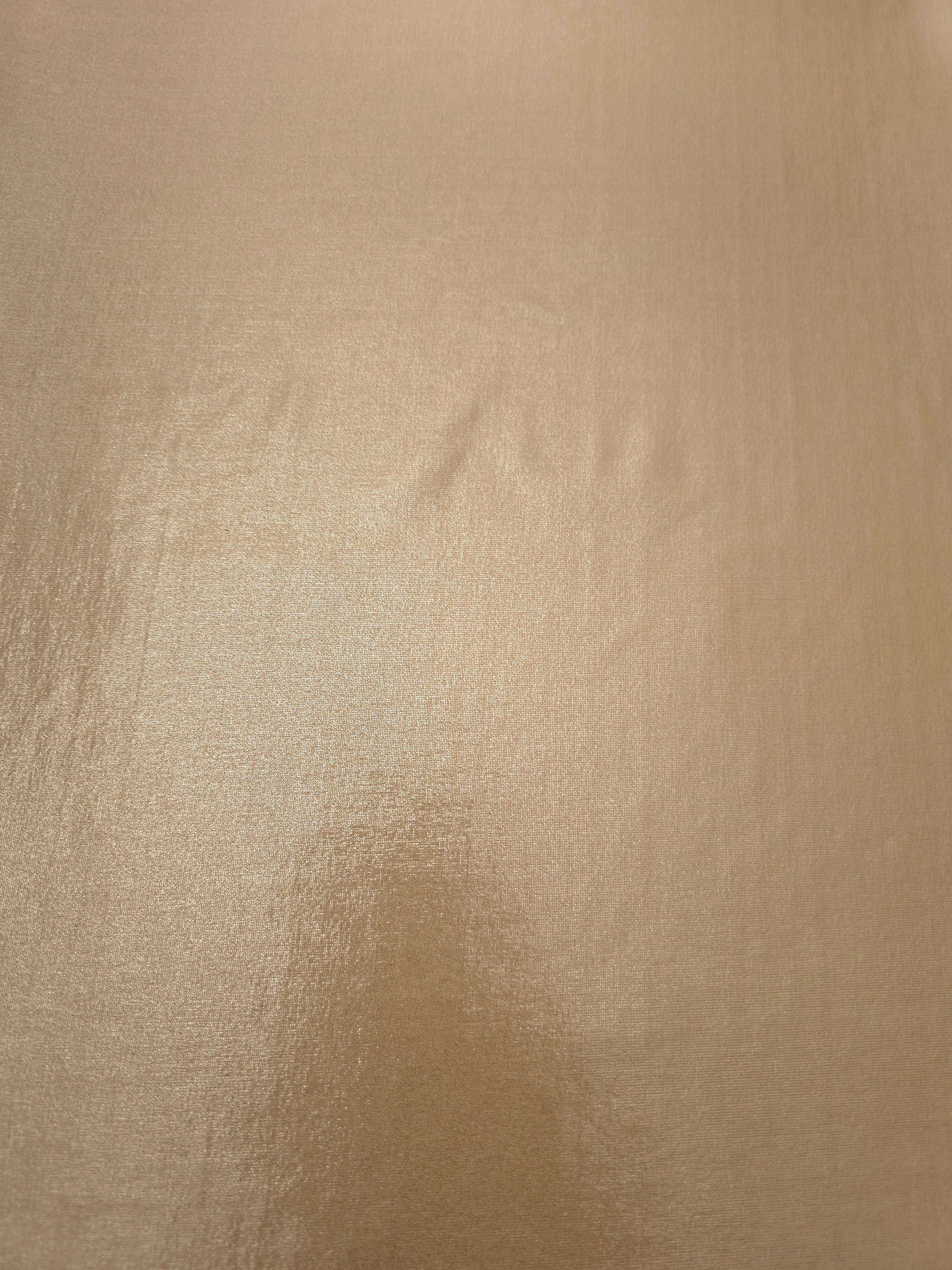 Warm Taupe Beige metallic foiled spandex shown flat, reflective stretch fabric for dancewear, eveningwear and statement garments