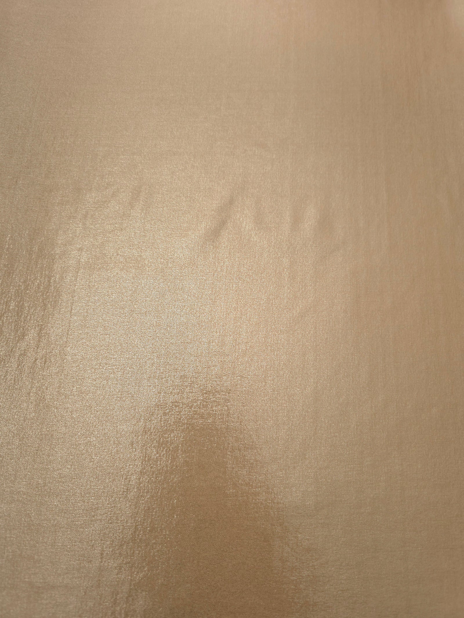 Warm Taupe Beige metallic foiled spandex shown flat, reflective stretch fabric for dancewear, eveningwear and statement garments