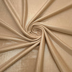 Warm Taupe Beige shimmer foiled stretch fabric arranged in a swirl, highlighting movement and reflective finish for performancewear